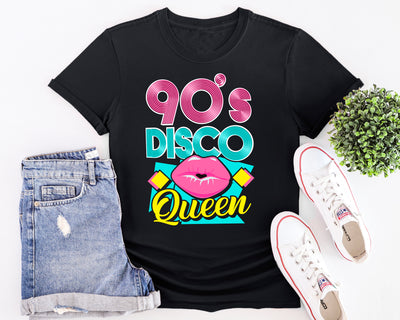 Flat lay of 90’s Pink Disco Queen t-shirt with bold retro lettering and pink disco theme design.
