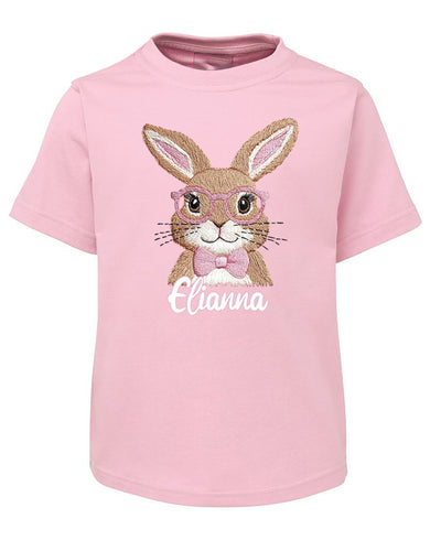 Pink t-shirt with a bunny graphic and 'Elianna' text on a white background