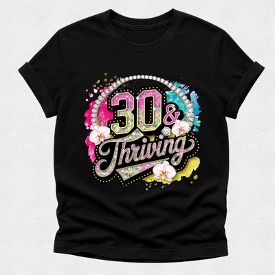 Black t-shirt with '30 & Thriving' design on a light gray background