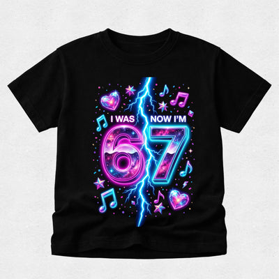 Black t-shirt with colorful 'I was 67 now I'm' design on a light gray background