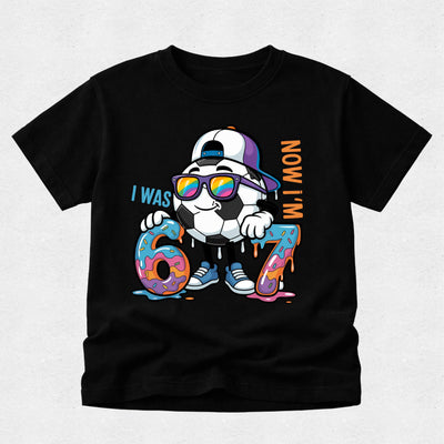 Black boys 7th birthday t-shirt with "I Was 6 Now I'm 7" soccer ball birthday design.