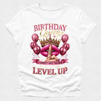 White t-shirt with pink birthday-themed graphics and text on a white background