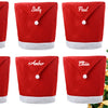 Custom Christmas chair covers with names for holiday dining décor