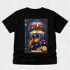 A black short-sleeve crewneck t-shirt featuring a large graphic print of a children's book titled 'The Police Adventure: I Saw Santa Claus Deliver Christmas' on the front, displayed against a light gray textured background.
