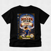 A black short-sleeve t-shirt with a large custom graphic print of a children's book cover titled 'The Soccer Star Starring David'. The graphic features an illustration of a boy in a blue soccer uniform on a field with a stadium background, and the book spine is shown on the left side of the cover.