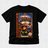 A black short-sleeve t-shirt with a large, colorful graphic print on the front depicting the book cover of 'The Fireman Adventure: Learning Zane'. The shirt is displayed flat against a light gray textured background.