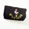 Black t-shirt with a graphic design and 'FLYNN' text on a white background