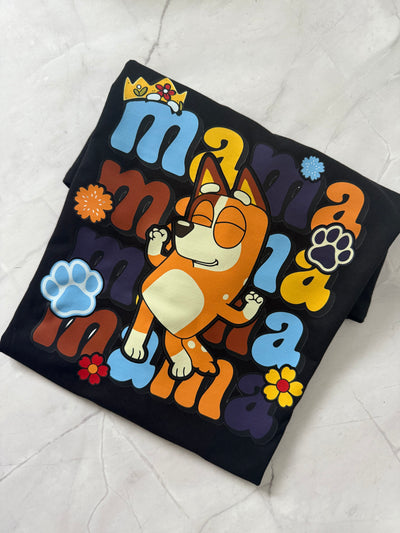 Just a Mama Who Loves Bluey inspired T-shirt flat lay