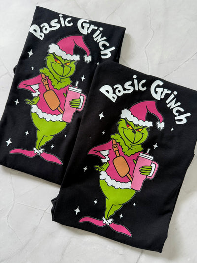 Close-up of Basic Grinch Pink Christmas Tshirt – playful holiday design with pink cross-over bag