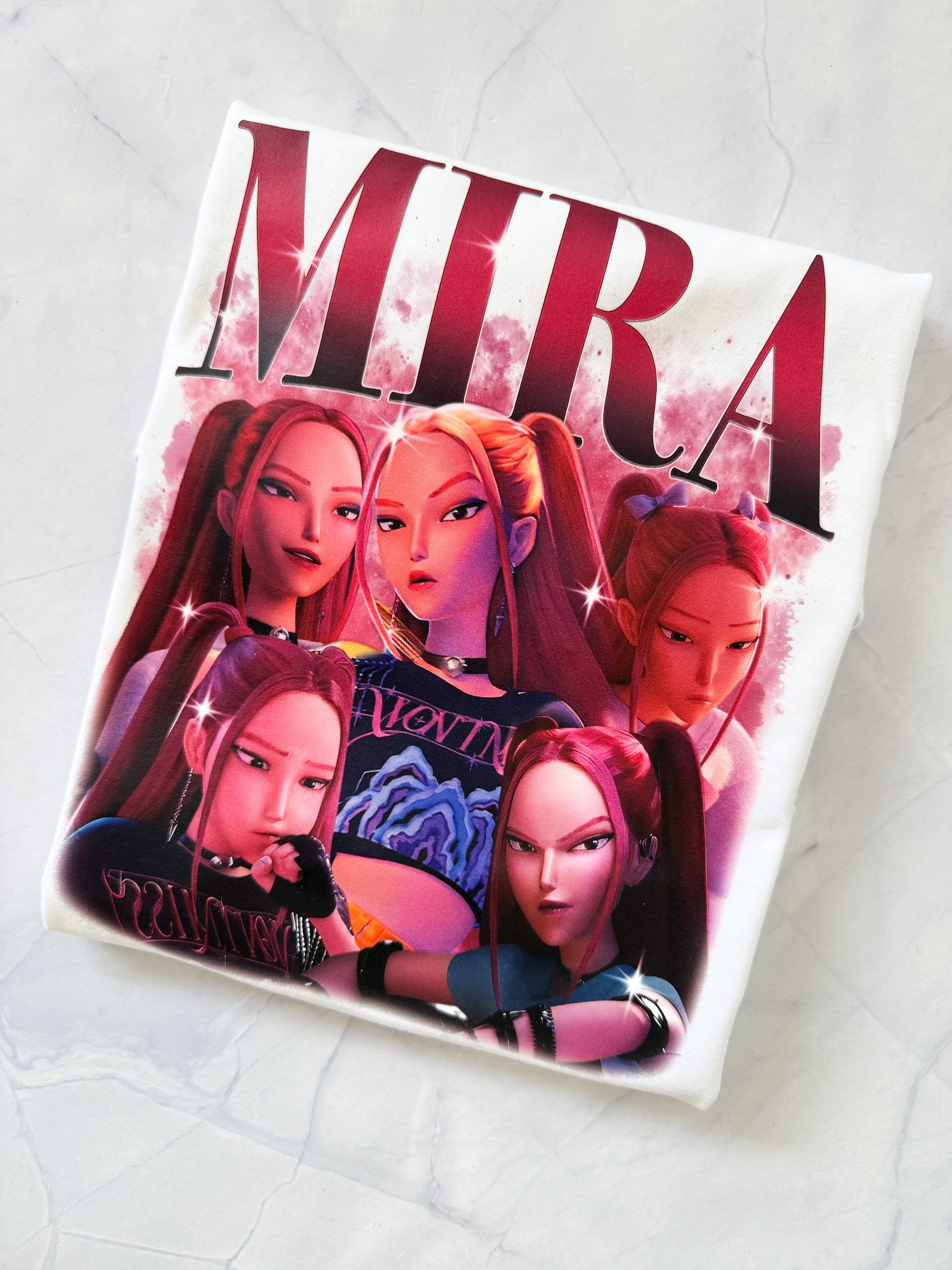 Product packaging with animated characters and the word 'MIRA' on a light gray background