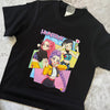 Huntrix streetwear shirt with bold anime girl illustrations and graphic lettering