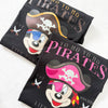 Two black pirate-themed shirts with mickey and minnie yo ho yo ho