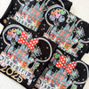 Detailed close-up of Classic Magical Kingdom t-shirt print, featuring castle and whimsical lettering.