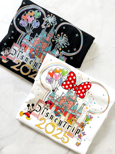 Classic Magical Kingdom t-shirt with vintage-style Disney-inspired castle design, laid flat on a neutral background.