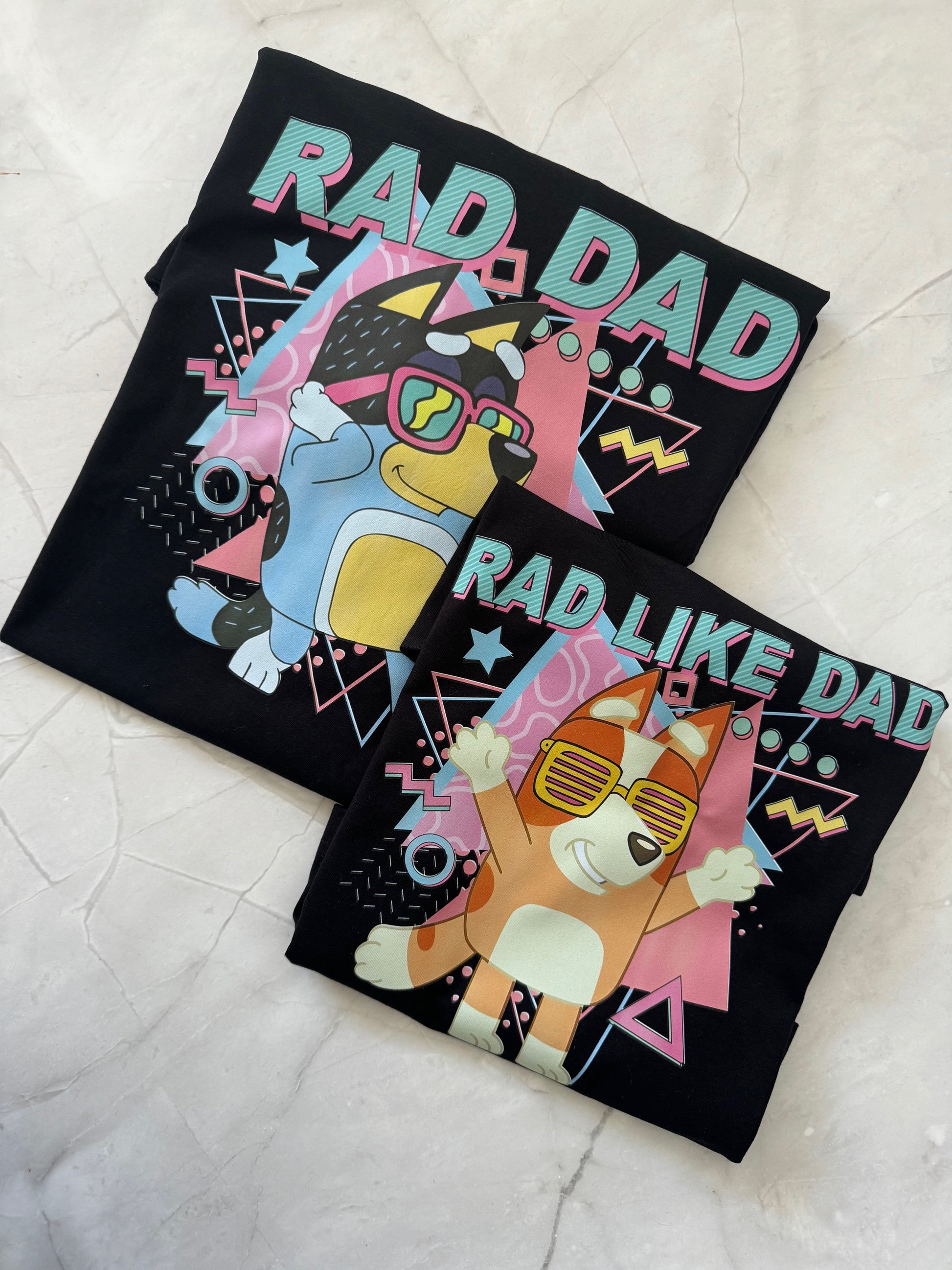 Close-up of Rad Dad Bluey inspired t-shirt design on soft cotton fabric