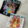 Close-up of Rad Dad Bluey inspired t-shirt design on black and white shirts