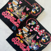 Close-up of “Royal Birthday Gang” text and crown design on white t-shirt