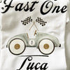 Close-up of “Mummy Fast One” t-shirt with vintage-style race car and checkered flags.