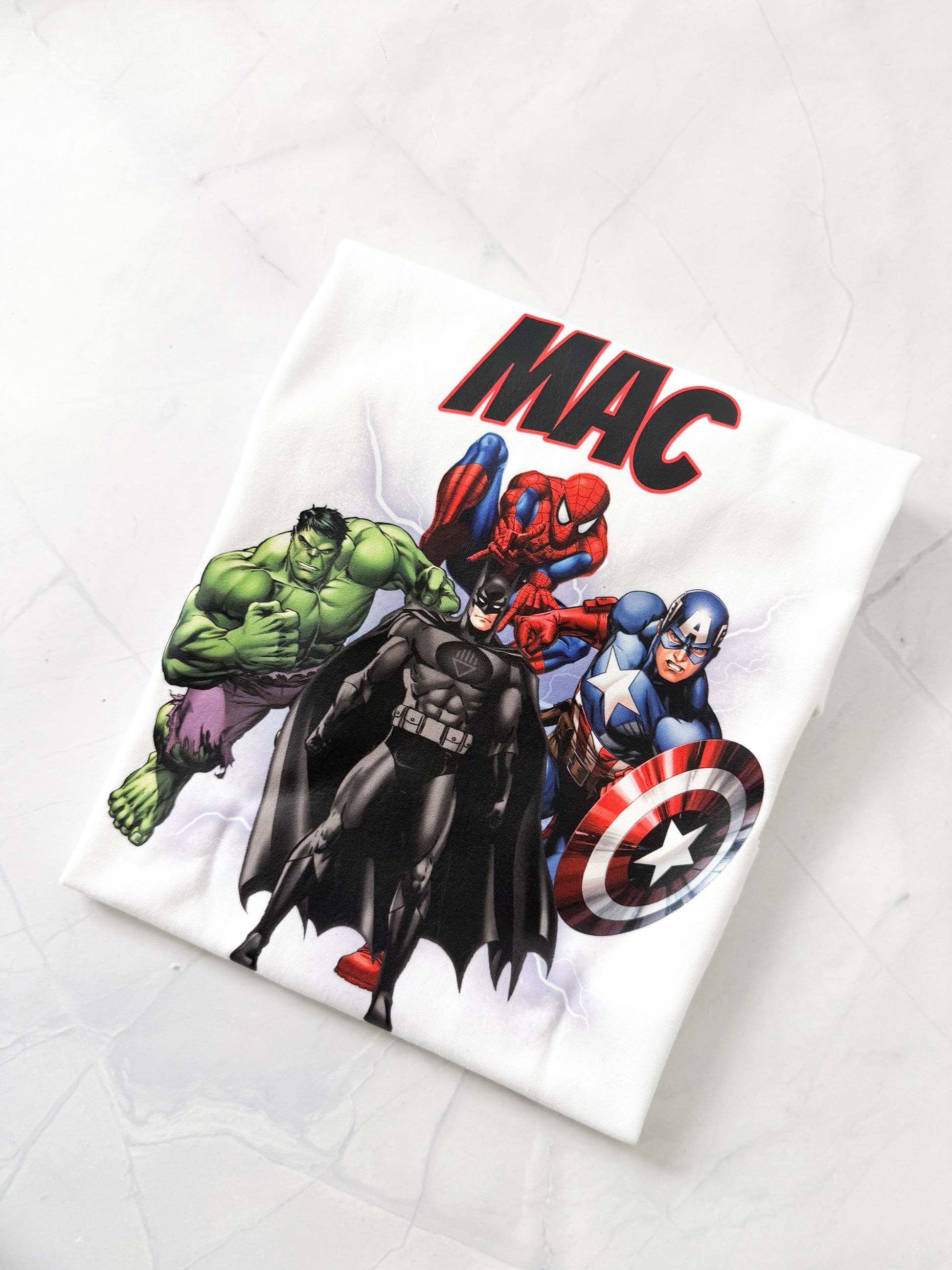 Close-up of superhero character print on birthday t-shirt