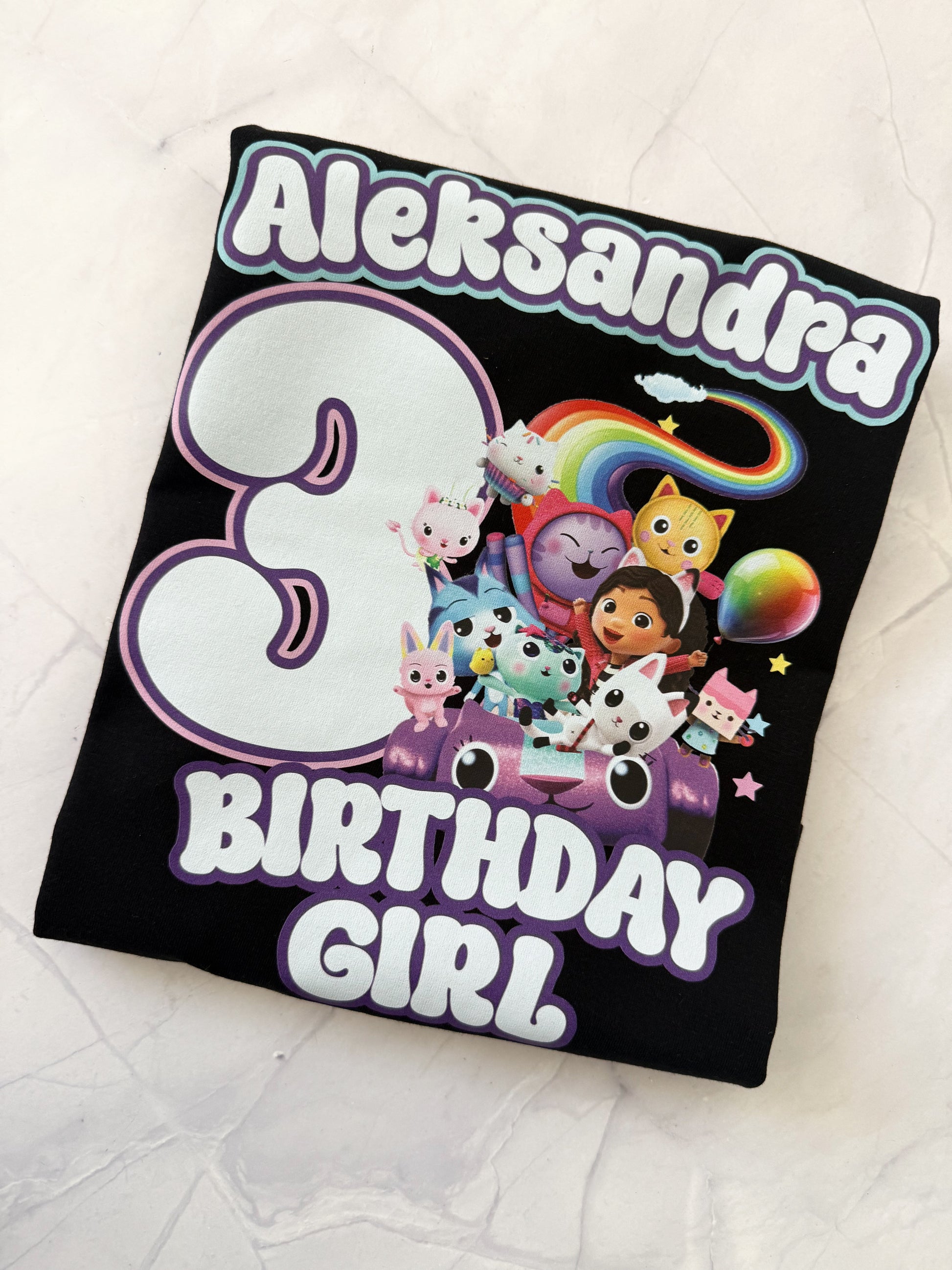 Back view of Gabby's Dollhouse inspired birthday t-shirt