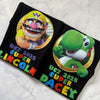 Kids flat lay Super Mario inspired birthday party t-shirts