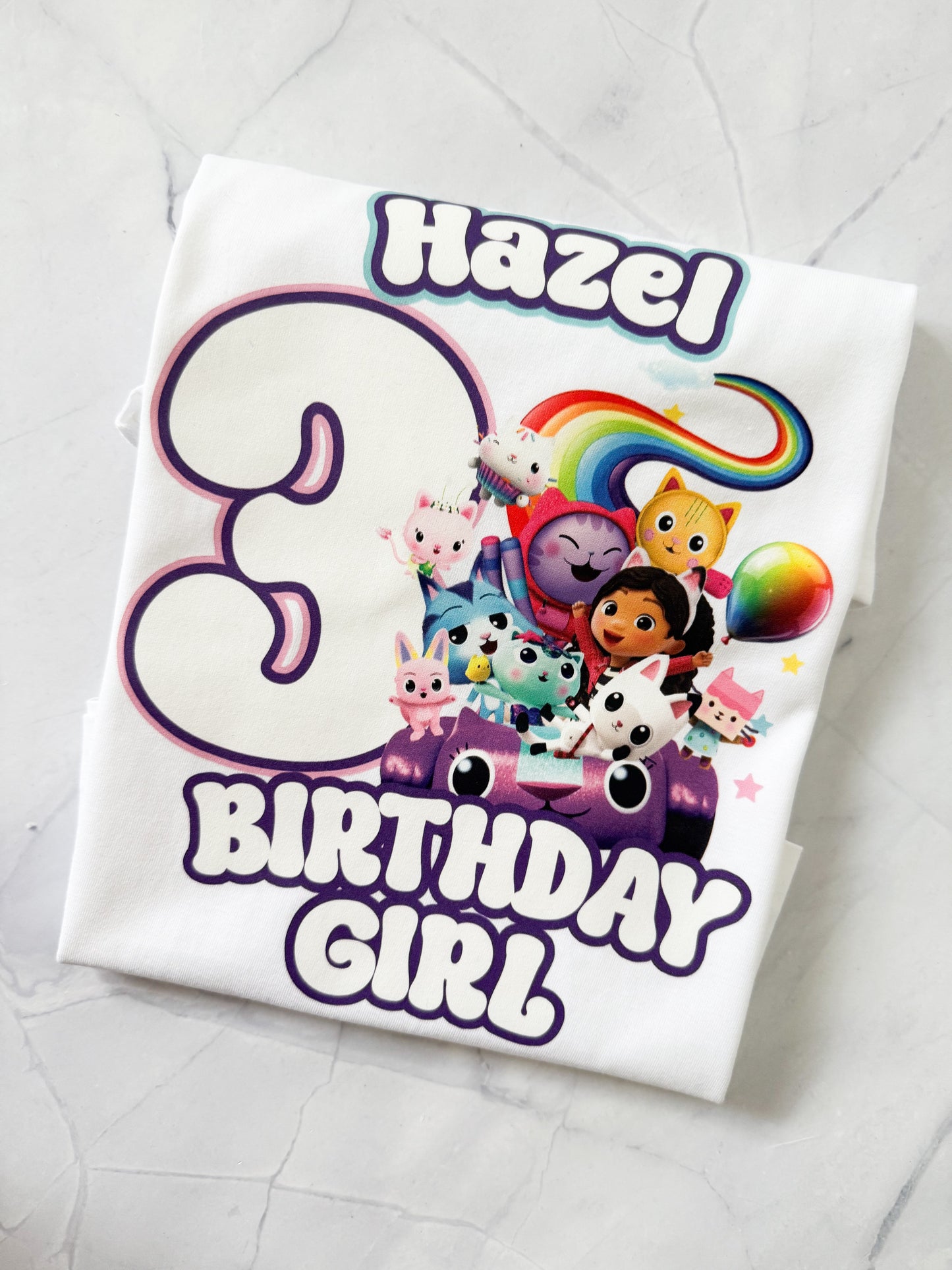 Child wearing Gabby's Dollhouse birthday t-shirt