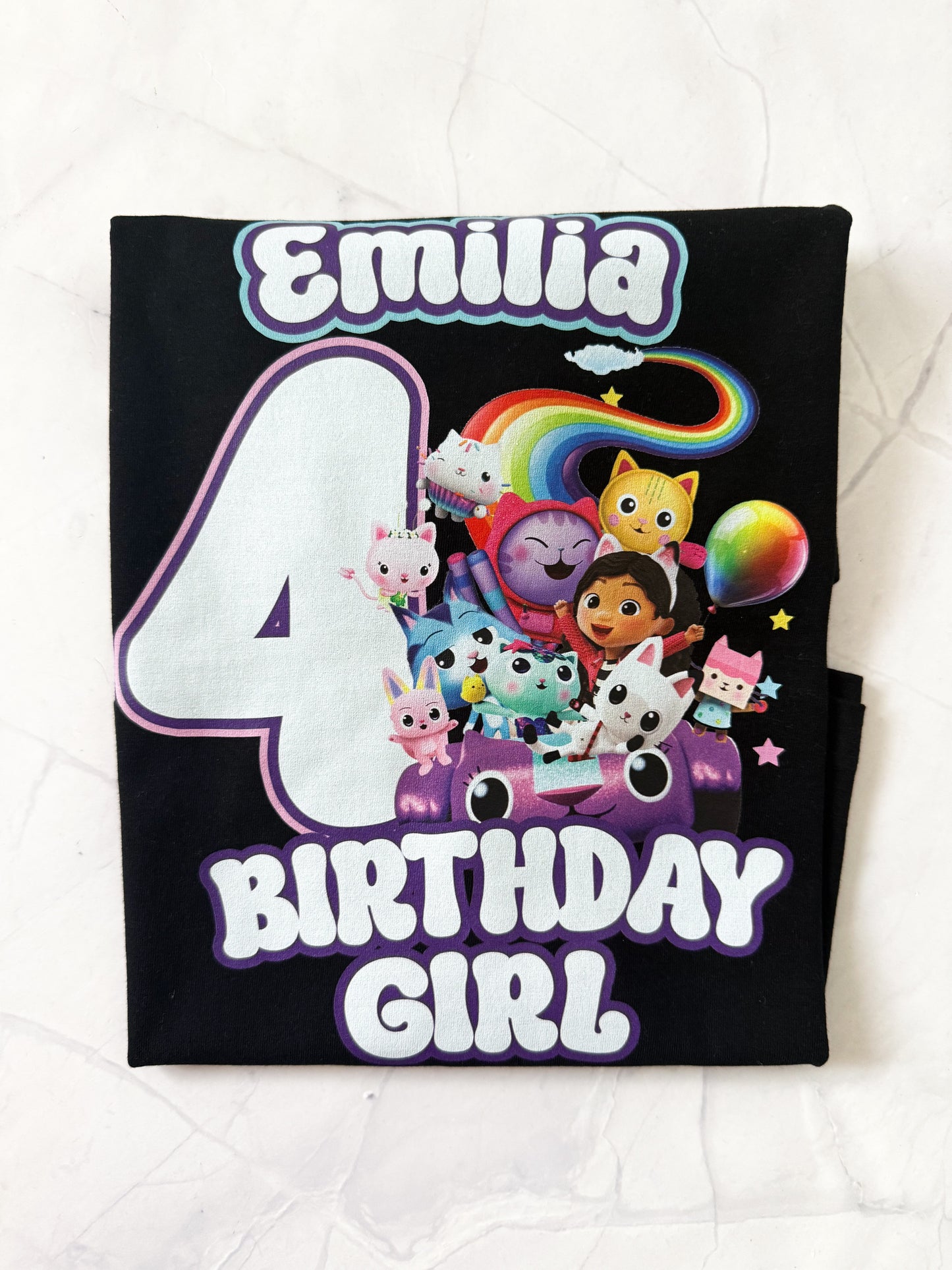 Gabby's Dollhouse inspired birthday t-shirt with birthday party props