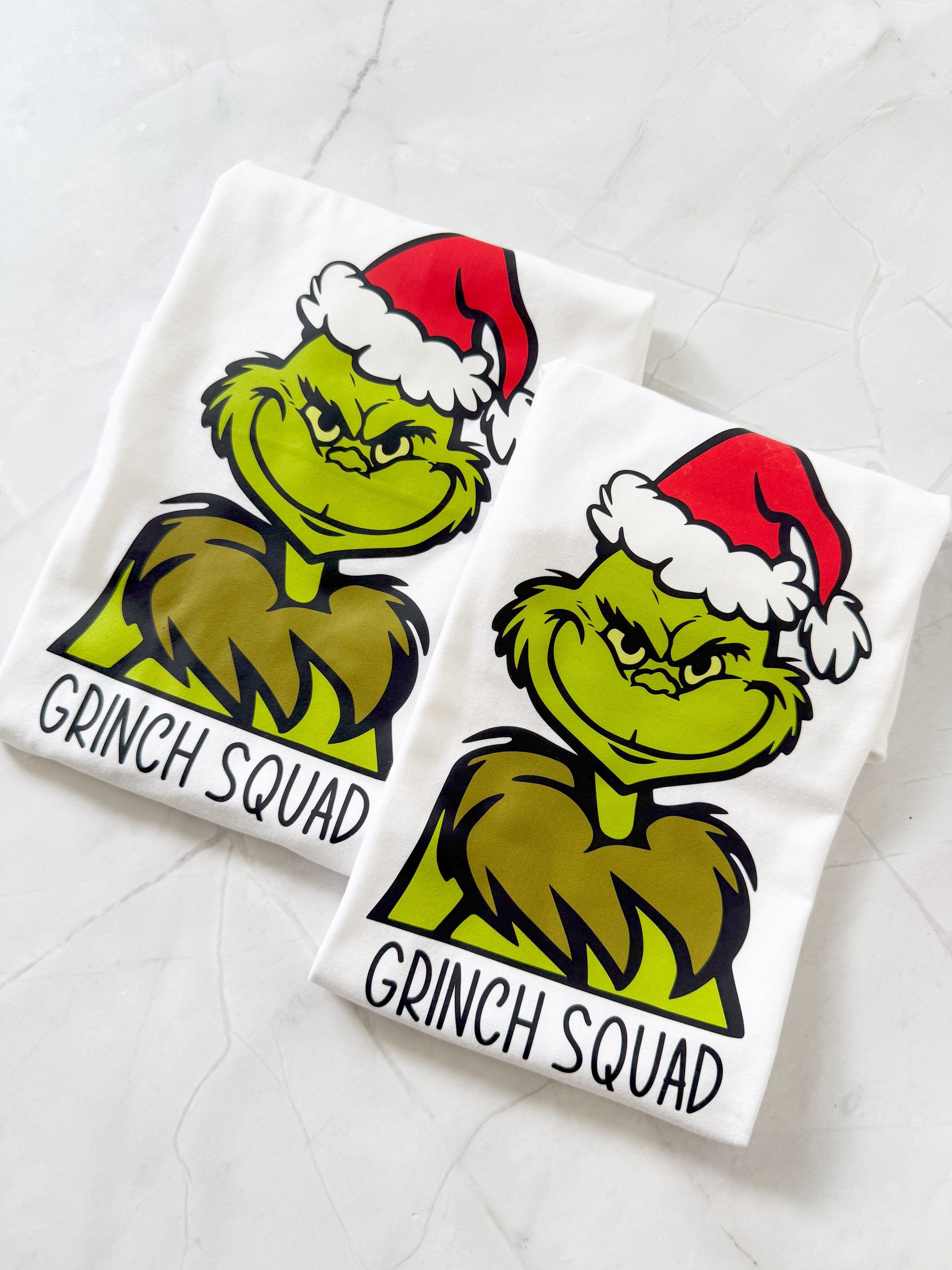 Custom Grinch-themed Christmas shirt perfect for matching family outfits