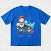 A royal blue short-sleeve t-shirt with a custom cartoon graphic of two superheroes, labeled 'Daddy' and 'Sue', celebrating 'Father's Day'. The shirt is displayed flat against a light gray textured background.