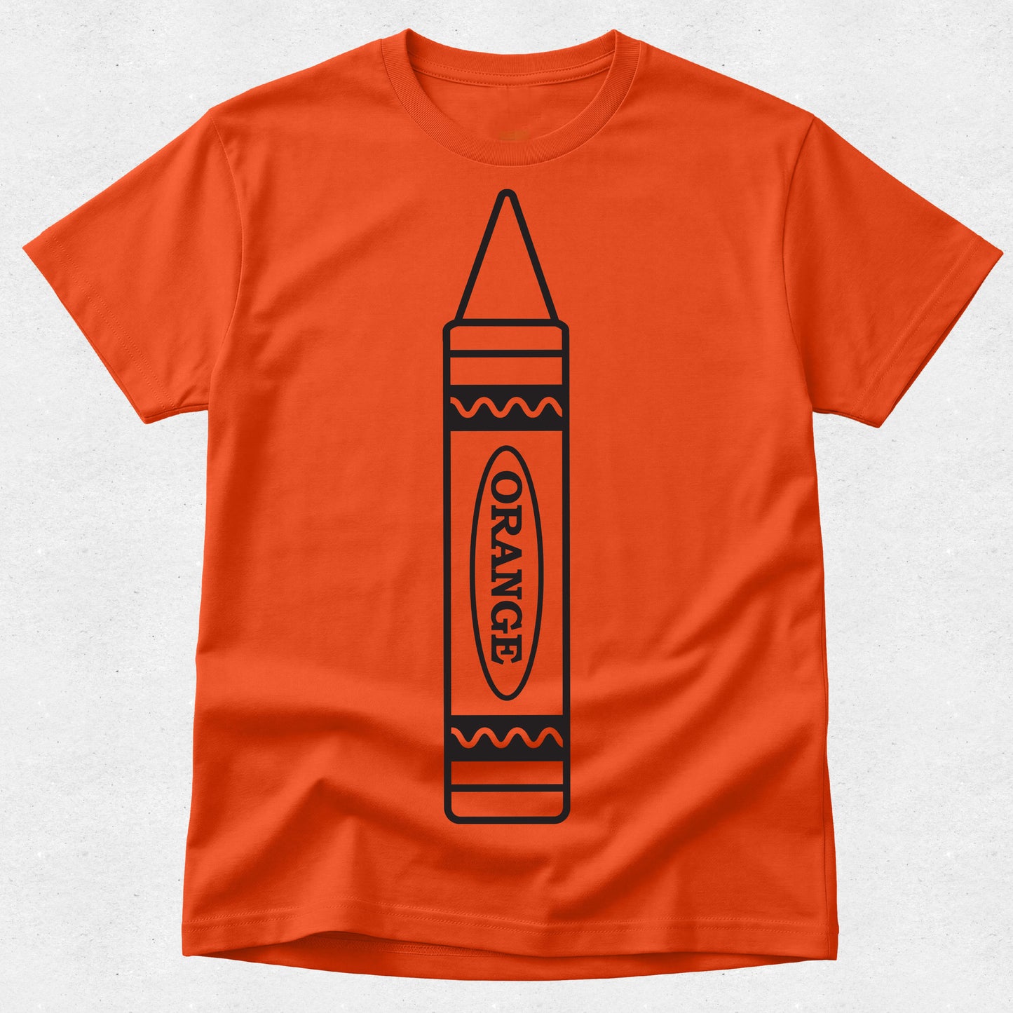 An orange short-sleeve crewneck t-shirt featuring a black line art graphic of a crayon with the word 'ORANGE' printed vertically on the front, set against a light gray textured background.