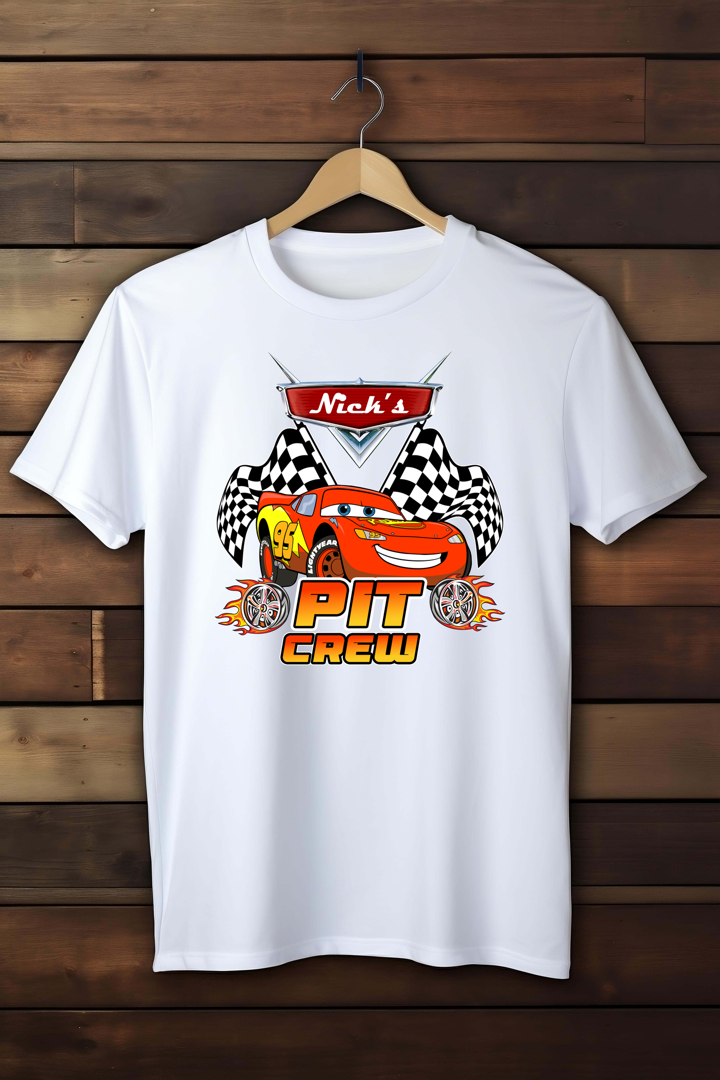 White t-shirt with a colorful graphic design on a wooden background