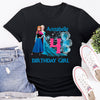 Black t-shirt with Frozen-themed design, denim shorts, and white sneakers on a white background