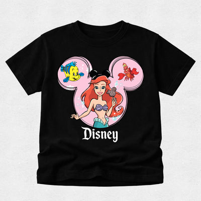 Black t-shirt with Disney character design featuring Ariel and Minnie Mouse ears on a light gray background