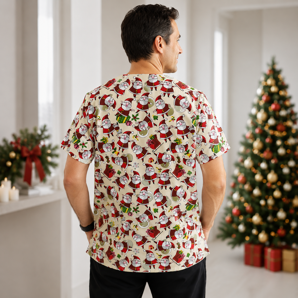 Man wearing a festive shirt with Santa Claus pattern in a room with Christmas decorations.