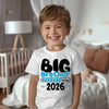 Child wearing a 'Big Brother 2026' shirt in a bedroom setting