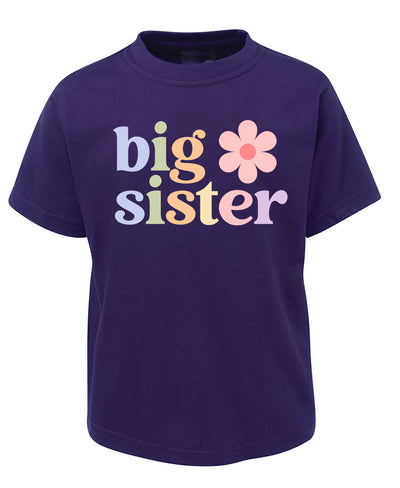 Purple t-shirt with 'big sister' text and a flower graphic on a white background