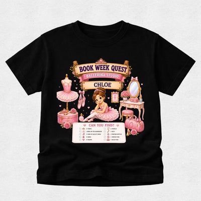 A black short-sleeve t-shirt with a detailed graphic print on the front. The graphic features a pink and gold 'Book Week Quest' banner with 'Ballerina Studio' and 'Chloe' written on it, surrounded by illustrations of a ballerina, a pink tutu, a vanity table, and a pink handbag, with a checklist below reading 'Can You Find?'.