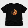 A black short-sleeve crewneck t-shirt featuring a graphic print of a partially eaten chocolate chip cookie with crumbs, displayed on a light gray textured background.