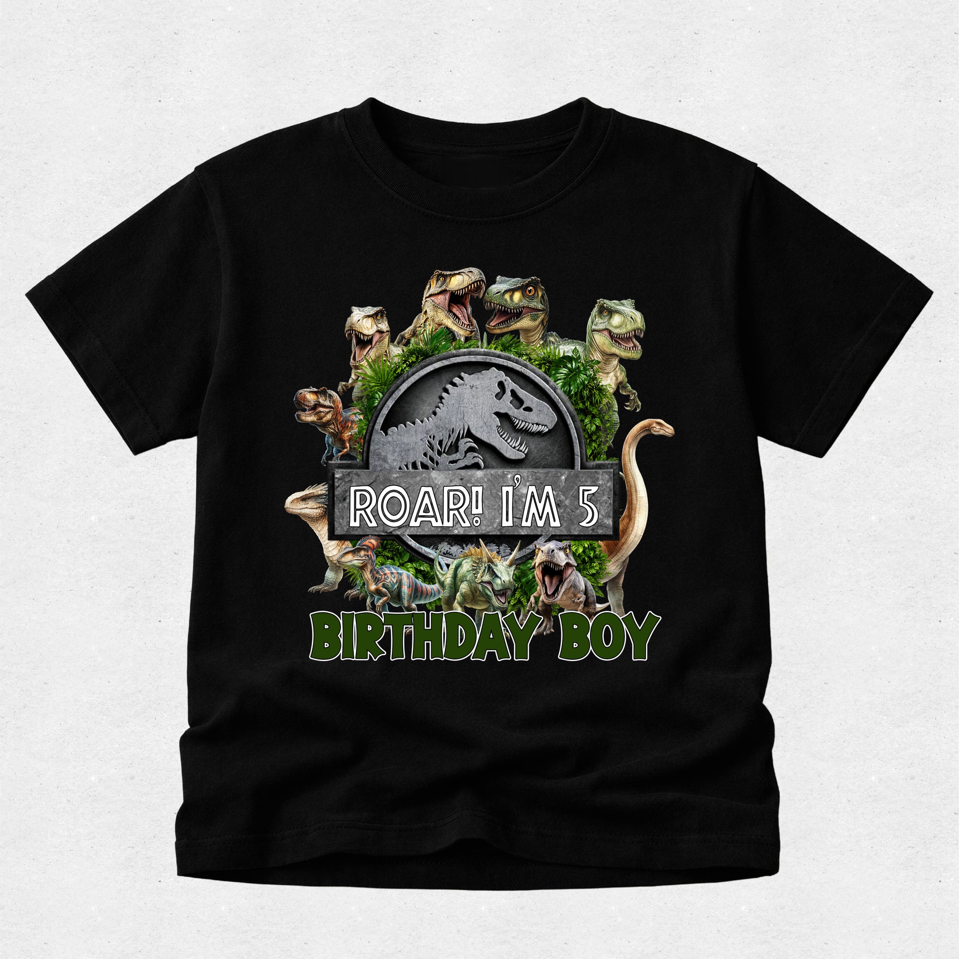 Black t-shirt with dinosaur graphic and 'Roar! I'm 5 Birthday Boy' text on a light gray background