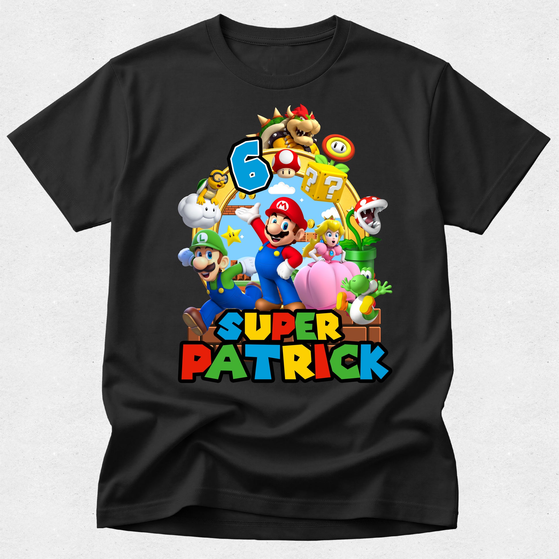 Black t-shirt with colorful 'Super Mario' design and text on a white background