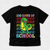 Black t-shirt with a dinosaur graphic and '100 Days of School' text on a light gray background