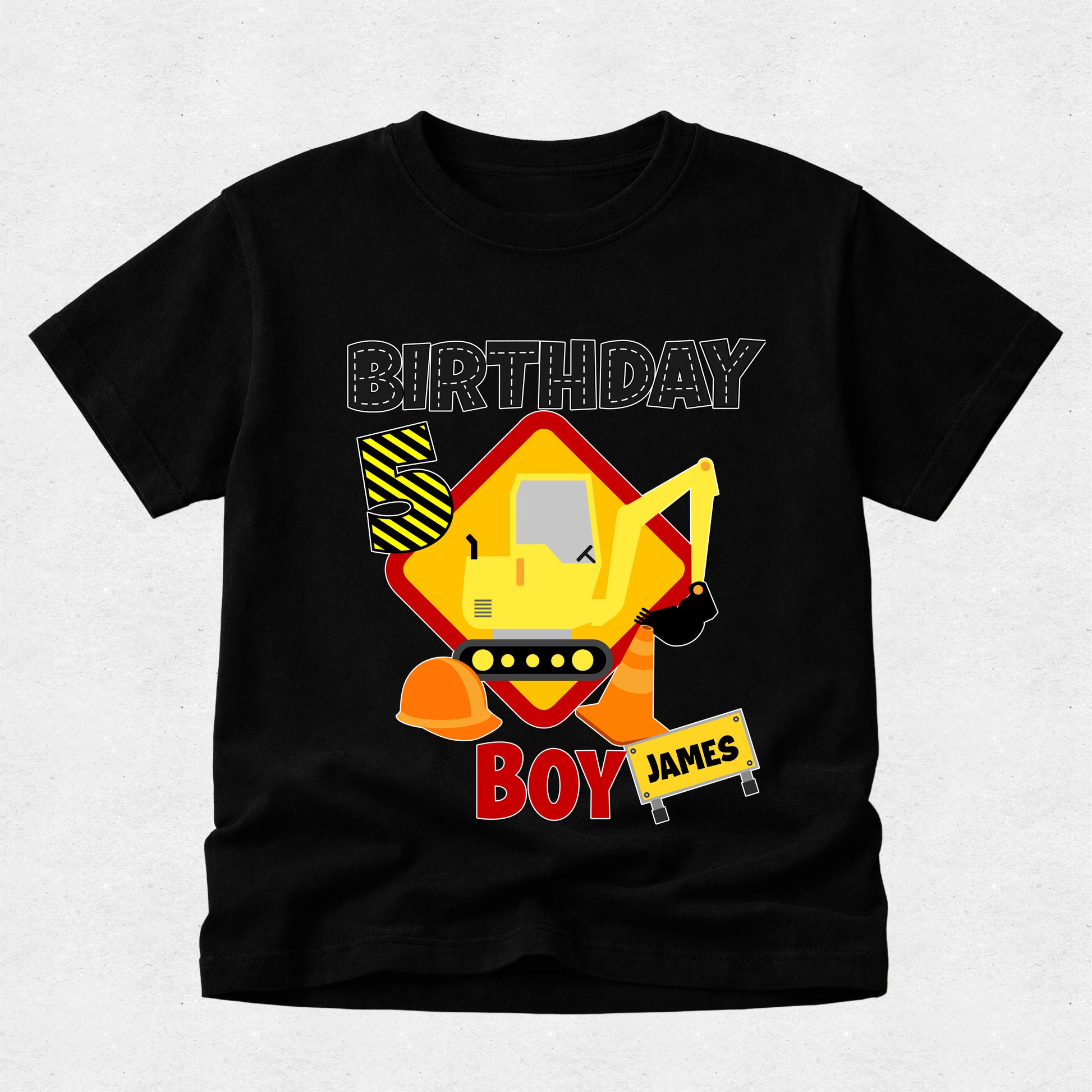 Black t-shirt with a construction-themed design and 'Birthday Boy James' text on a light gray background