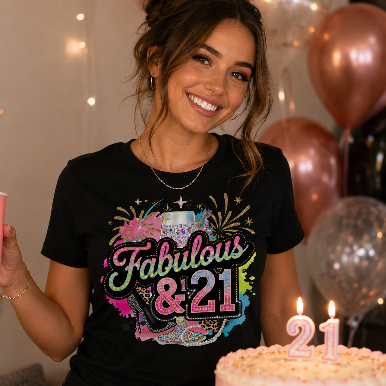 Woman celebrating her 21st birthday with a cake and balloons.