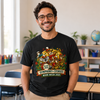 Man wearing a black t-shirt with a colorful design in a classroom setting