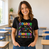 teacher wearing colour the world with kindess tshit