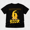 Black t-shirt with a construction-themed birthday design on a light gray background