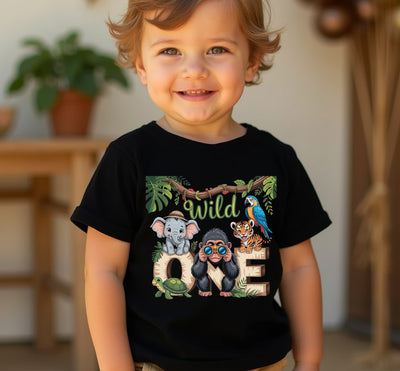 Child wearing a black t-shirt with animal-themed design and text, standing indoors.