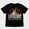 Black t-shirt with colorful cartoon characters and castle design on a light gray background
