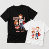 Two custom graphic t-shirts displayed on a light gray background, one black and one white. Both shirts feature a cartoon illustration of a father and daughter in superhero costumes with the text 'HAPPY FATHER'S DAY' and 'NICOLE DADDY'.