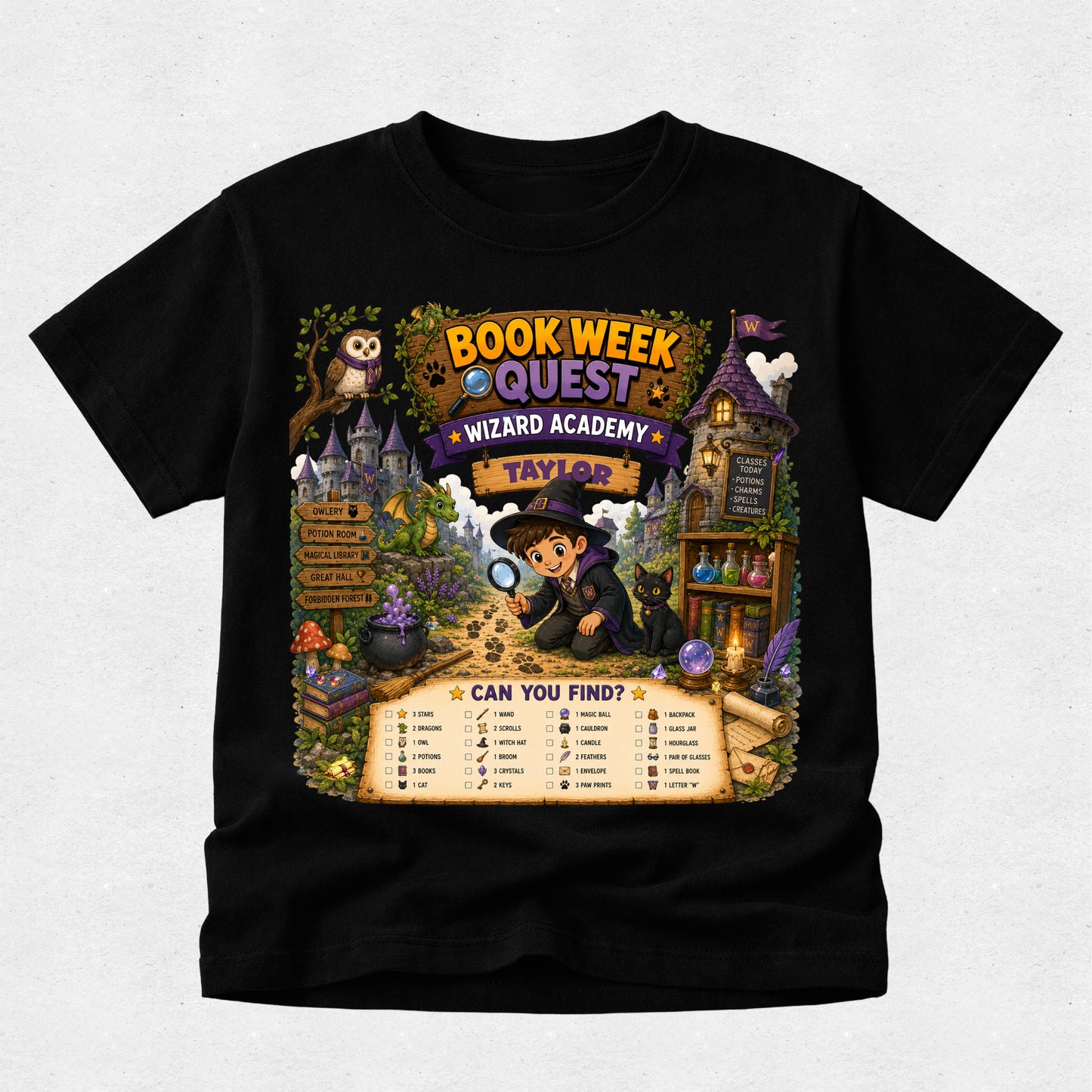 A black short-sleeve t-shirt with a large, colorful wizard-themed graphic on the front. The graphic features the text 'BOOK WEEK QUEST', 'WIZARD ACADEMY', and 'TAYLOR' above an illustration of a wizard with a magnifying glass, a castle, an owl, and a treasure chest.